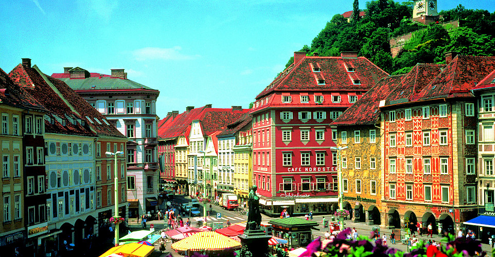 Graz's main square with Clocktower above. Photo via Austrian National Tourist Office