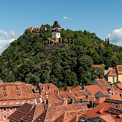 Cycling the Mur River Valley to Graz - Clocktower in Graz, Austria. Wikimedia Commons:Ralf Roletschek