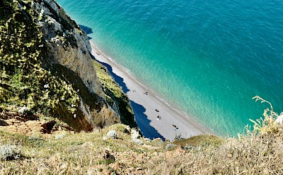 Beach at Étretat, France. Unsplash@Lynn Van den Broeck