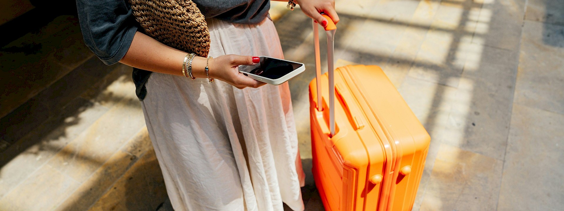 Setting off on a trip with a packed suitcase and GPS. Unsplash@Ahmet Kurt