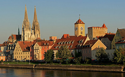 Along the Danube in Regensburg with its Rathaus. CC:Avarim
