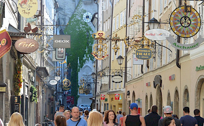 Shopping the famous <I>Getreidegasse</I> in Salzburg, Austria. Flickr:Flightlog 47.800125867092575, 13.04288843816782