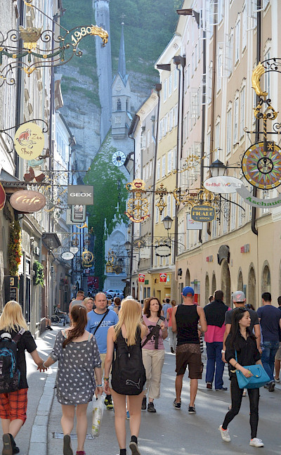 Shopping the famous <I>Getreidegasse</I> in Salzburg, Austria. Flickr:Flightlog 47.800125867092575, 13.04288843816782
