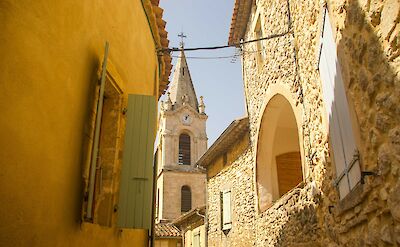 Church tower, Ardèche, France. Unsplash:Paola Capelletto