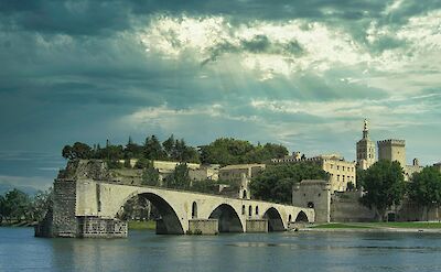 Clouds over a bridge, Avignon, France. Unsplash:Roelf Bruinsma