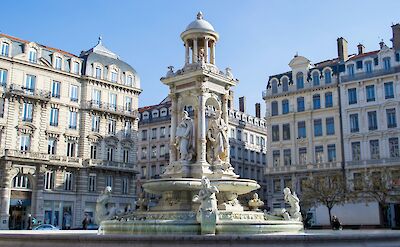 Fountain in a square, Lyon, France. Unsplash:Diogo Nunes