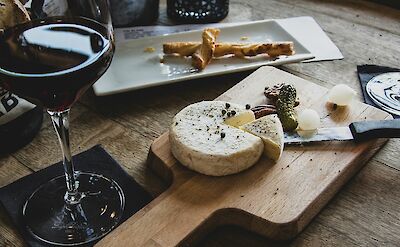 French cheese and wine, France. Unsplash:Camille Brodard