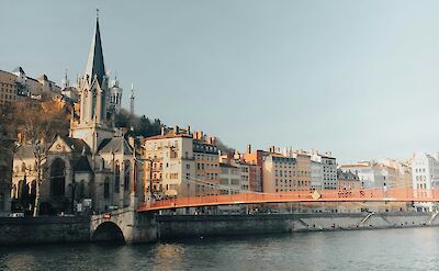 Red bridge over the river, Lyon, France. Unsplash:Nguyen Dang Hoang Nhu