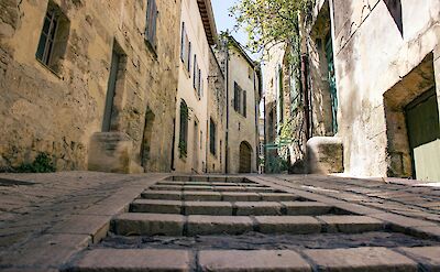 Streets of Avignon, France bike boat tours. Unsplash:Arnaud Mariat