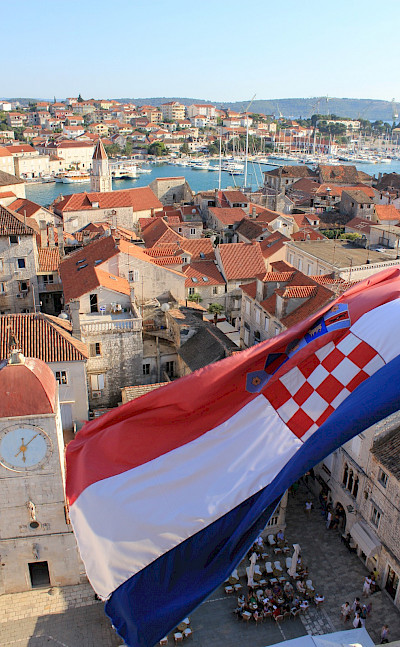 Croatian flag flying in Trogir, Dalmatia. Photo via Flickr:Jeremy Couture