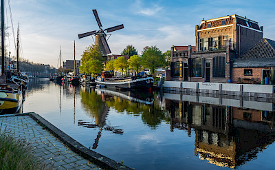 Harbor and windmill in Gouda, South Holland, the Netherlands. Flickr:Frans Berkelaar