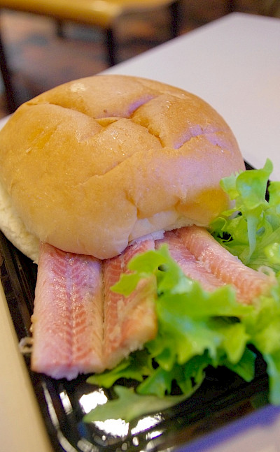 Traditional herring sandwich in the Netherlands. Flickr:Tomoaki INABA