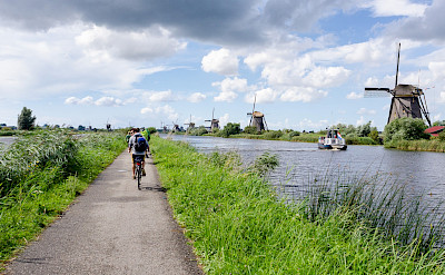 Biking the beautiful windmill region of Kinderdijk, South Holland, the Netherlands. Flickr:Luca Casartelli