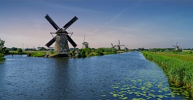 Quiet bike paths in the Kinderdijk, South Holland, the Netherlands. Photo via Flickr:Norbert Reimer