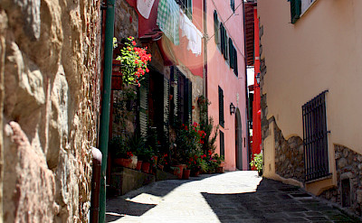 Cobbled alley in Montecatini Terme, Tuscany, Italy. Photo via Flickr:Graeme Maclean