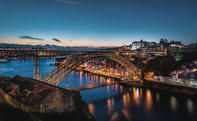 Dom Luis I Bridge at night, Porto, Portugal. Unsplash:Daniel Sessler