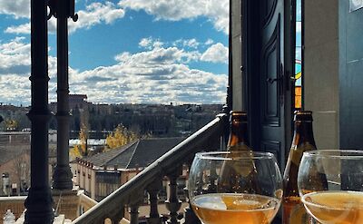 Glasses of beer overlooking Salamanca, Portugal. Unsplash:Leosprspctive