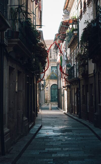 Side street in Guimaraes, Portugal. Unsplash:Edgar