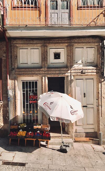 Small produce stall in Guimaraes, Portugal. Unsplash:Apricity