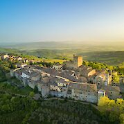 Umbria - Gastronomy Bike Tour - Aerial view of a historic stone village in Umbria, Italy. Unsplash@Getty Images