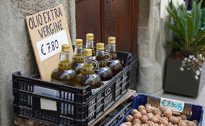 Olive oil for sale, Italy. Unsplash@Palmtree Society