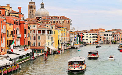 Biking and boating in Venice, Italy. Photo via Flickr:Tambako the Jaguar