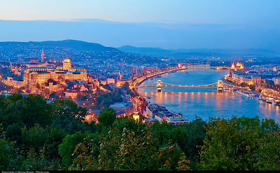 Budapest on the Danube River with Buda Castle on the left and Hungarian Parliament on the right. Photo via Flickr:Moyan Brenn 47.495397, 19.056408