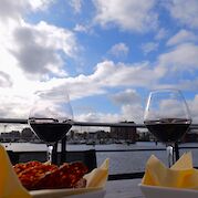 Wine on board and a view! | Fluvius | Bike & Boat Tour