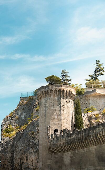 Castle ramparts in Avignon, France bike tour. Unsplash@Ryan Klaus