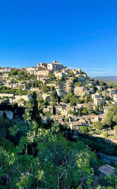 Hilltop village of Gordes, France bike tour. Unsplash@Noeha Coutry
