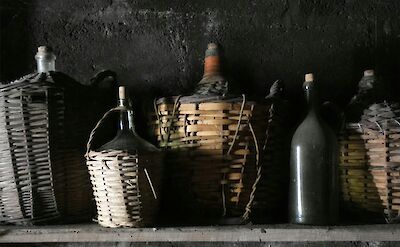 Old French wines. France bike tour. Unsplash@Didier Veillon