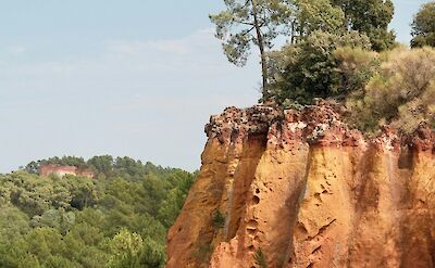 Red cliff in Roussillon, France bike tour. Unsplash@Artem R