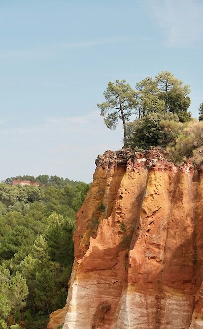 Red cliff in Roussillon, France bike tour. Unsplash@Artem R
