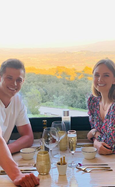 Restaurant with a view in Gordes, France bike tour. Unsplash@Thibault Ludwikowski