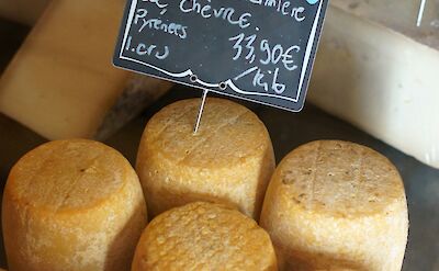 Tomato cheese for sale. France bike tour. Unsplash@Hans Westbeek