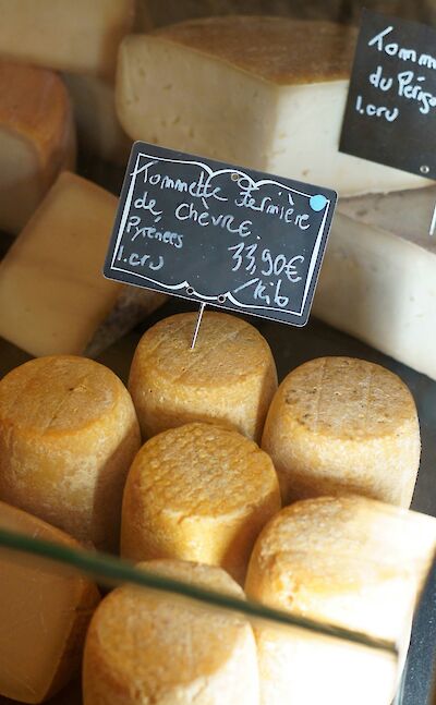 Tomato cheese for sale. France bike tour. Unsplash@Hans Westbeek