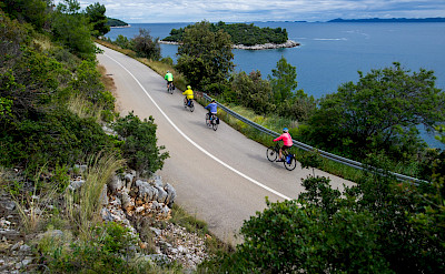 Cycling along the Dalmatian Coast on Korčula Island in Croatia.