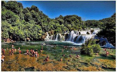 Swimming at the waterfalls at Krka National Park, Croatia. Flickr:Mario Fajt