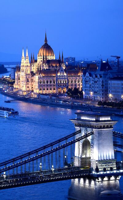 Bridges and buildings of Budapest at night, Hungary. Unsplash@Lok Gwan