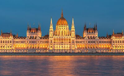 The Parliament Building illuminated at night, Budapest, Hungary. Unsplash@Jorge Franganillo