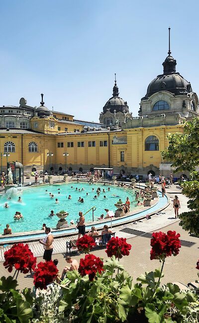 People bathing in Budapest's thermal baths, Hungary. Unsplash@Victor Malyushev