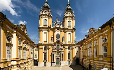 Yellow architecture of Melk Abbey, Austria. Unsplash@Andreas Weilguny