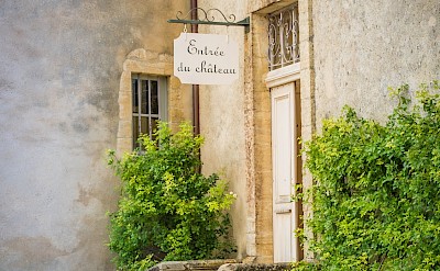 Château entrance in Dordogne, France. Unsplash:Aurora Borealis