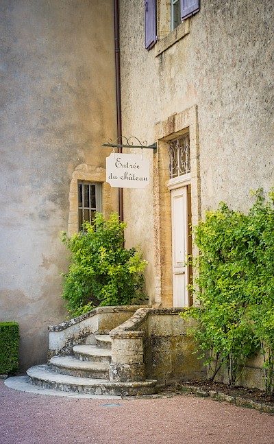 Château entrance in Dordogne, France. Unsplash:Aurora Borealis