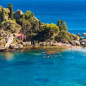 The Aeolian Islands of Sicily E-Bike & Boat - Isola Bella, a small island near Taormina, Sicily, Italy. CC:Solomonn Levi