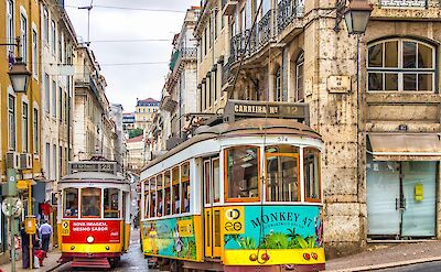 Cablecars in the middle of the roads of Lisbon, Portugal. Andreas M@Unsplash
