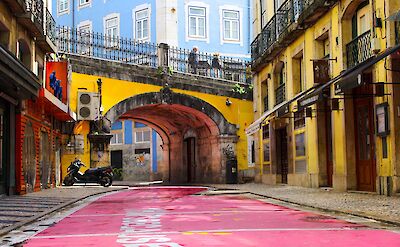 Pink street in Lisbon, Portugal. Sara Darcaj@Unsplash