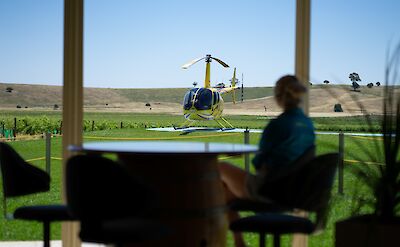 Helicopter viewed from the window, Barossa Valley, Australia. CC:Barossa Helicopters