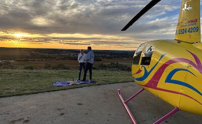 Sunset in front of the helicopter, Barossa Valley, Australia. CC:Barossa Helicopters