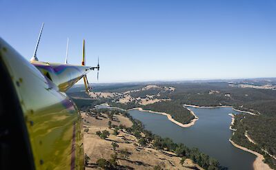 Flying over a reservoir, Barossa Valley, Australia. CC:Barossa Helicopters